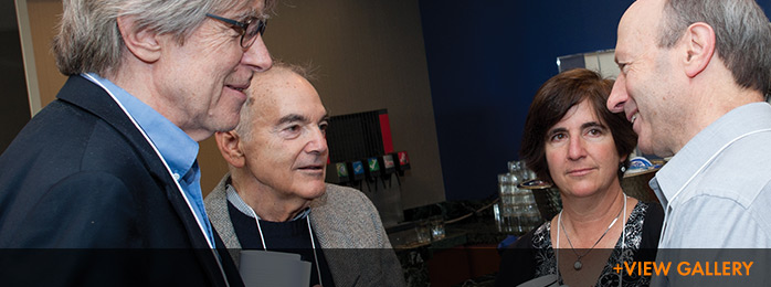 Life sciences professor Olke Uhlenbeck (left) conversed with Harold Widom (Widom's uncle), Barbara Widom-Wilson (his cousin), and session chair Bill Gelbart.