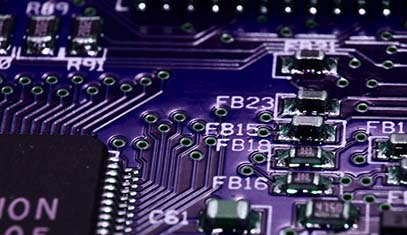 image of circuit board with purple tones