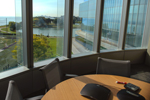 Conference room with a view:  Five conference rooms in the new building  are devoted to the Department of Economics. To help preserve energy and regulate temperature, the rooms’ window blinds  rise and fall in response to the sun. 