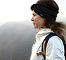 Margo in front of scenic background in the mountains