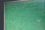 A Nobel Laureate’s notations: Professor Dale Mortensen, winner of the 2010 Nobel Prize in Economics, left behind a blackboard full of equations when he died in 2014. The board has been sprayed with a preservative to ensure that the chalk markings do not fade away. 